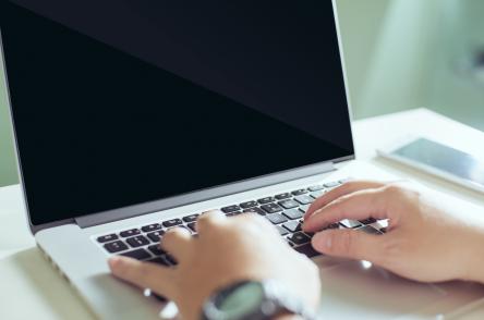 man using laptop